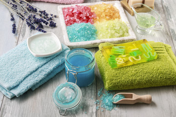 Colorful spa cosmetics on wooden table