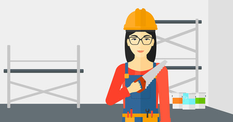 Smiling worker with saw.