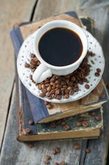 cup of coffee on wooden surface