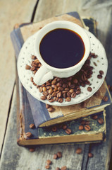 cup of coffee on wooden surface