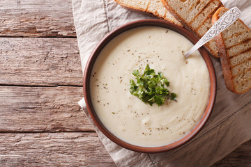 Du Barry French white soup on the table. horizontal top view 
