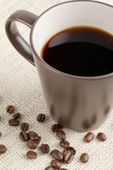 black coffee with coffee beans