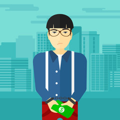 Man handcuffed for crime.