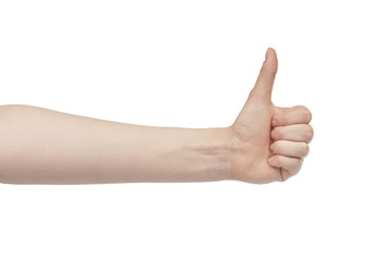 young woman left hand shows thumb up gesture, isolated on white