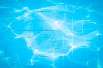Blue swimming pool rippled water detail