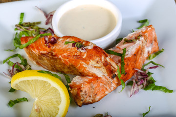 Baked salmon with sauce