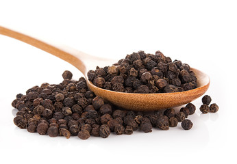 black peppers on the white background