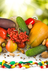 image of different vegetables and pills close-up