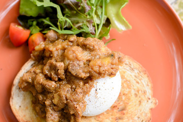 Beef in curry and benedict egg sanwich