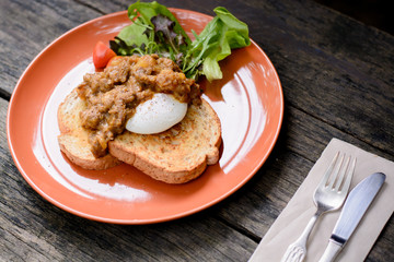 Beef in curry and benedict egg sanwich