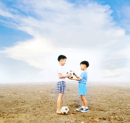 Boy share football