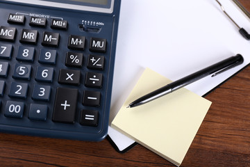 Office supply on wooden background