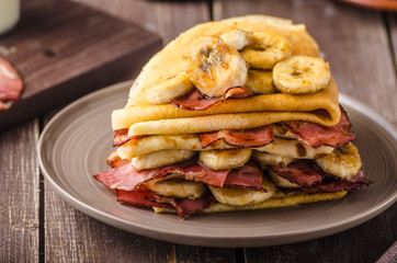Pancakes with bacon, banana and maple sirup