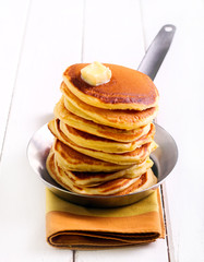 Pile of pancakes with butter
