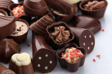 Assorted chocolate candies, close up