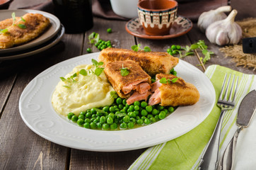 Fried salmon with mashed potato and vegetable