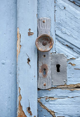 rundown blue door