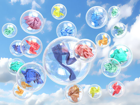 clothing in soap bubbles on sky background concept of washing