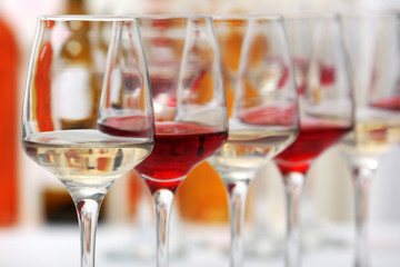 Wine glasses with red and white wine, closeup