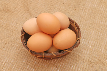 Easter eggs in a wooden basket.