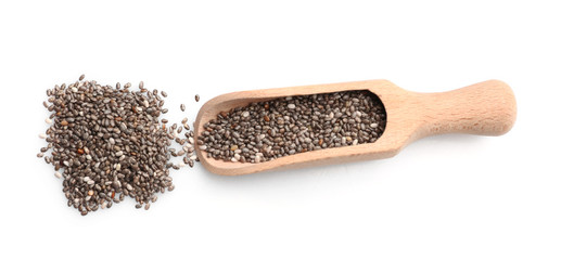 Chia seeds in scoop on white background