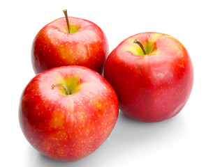 Pile of red juicy apples isolated on white background