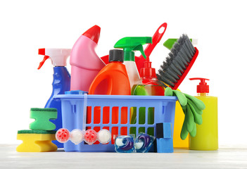 Basket of cleaning supplies on the floor