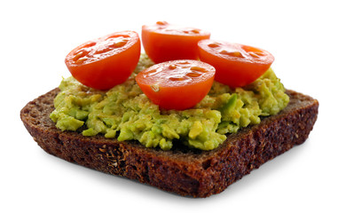 Avocado sandwich with tomatoes isolated on white