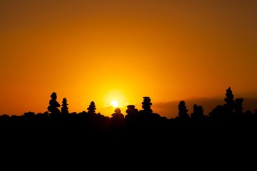 Sunset with stone piles Tenerife