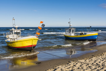 Two colorful fishing boats.