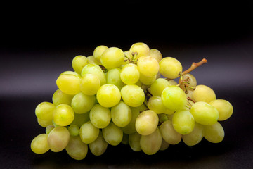 Grapes on black background