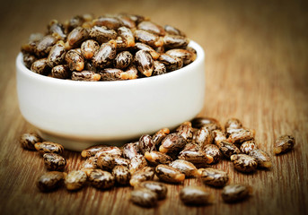 Castor beans in a ceramic bowl