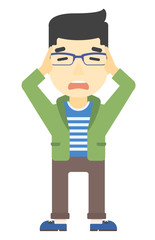 Man clutching his head in desperate.