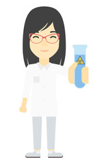 Laboratory assistant with test tube.