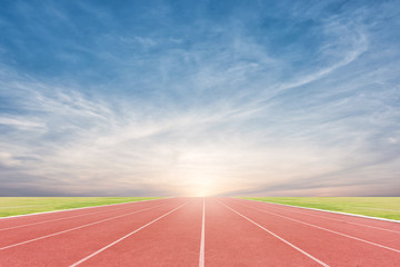 Athlete track or running track with sky sunset background