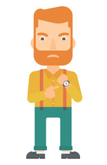 Angry boss pointing at wrist watch.