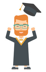 Graduate throwing up his hat.