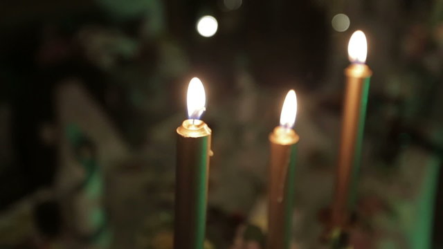 three burning candles