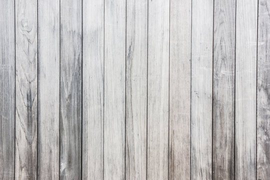 Wooden desks gray background.