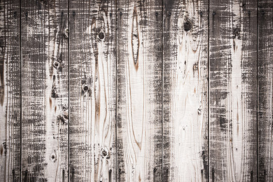 Stratched wooden desk surface background.