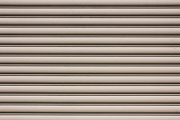 Metal stripped garage door lines pattern.