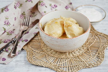 Vareniki with onion and sour cream