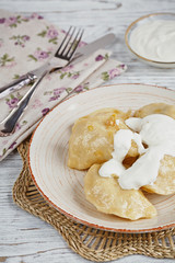 Vareniki with onion and sour cream