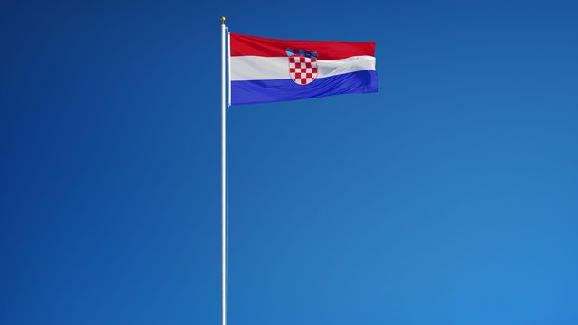 Croatia flag waving in slow motion against clean blue sky, seamlessly looped, long shot, isolated on alpha channel with black and white luminance matte, perfect for film, news, digital composition