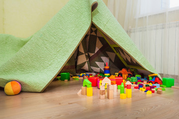 Some  wooden cubes on floor © OlgaKhorkova