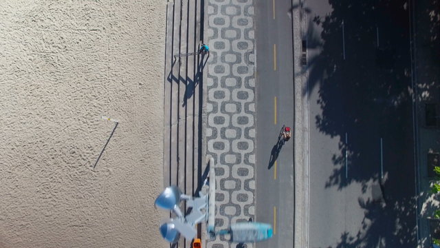 Flying above Ipanema Beach mosaic sidewalk and street, Rio de Janeiro, Brazil