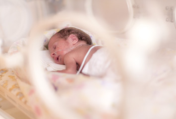 Premature newborn  baby girl