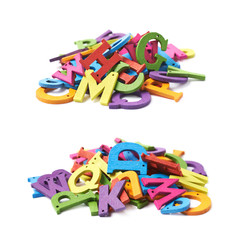 Fototapeta premium Pile of colorful wooden letters isolated