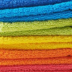 Pile of rainbow colored towels