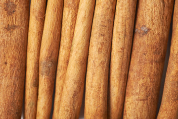 Surface covered with cinnamon sticks